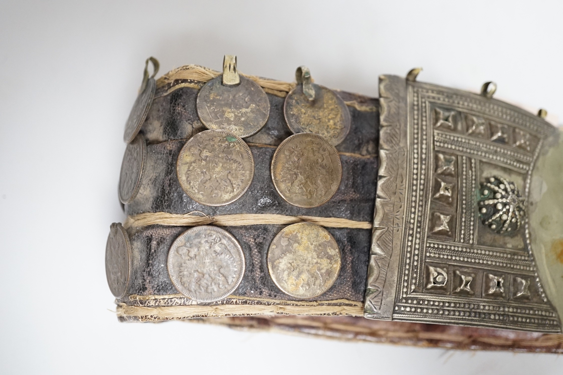 A 19th century Afghan belt, Russian coin mounted